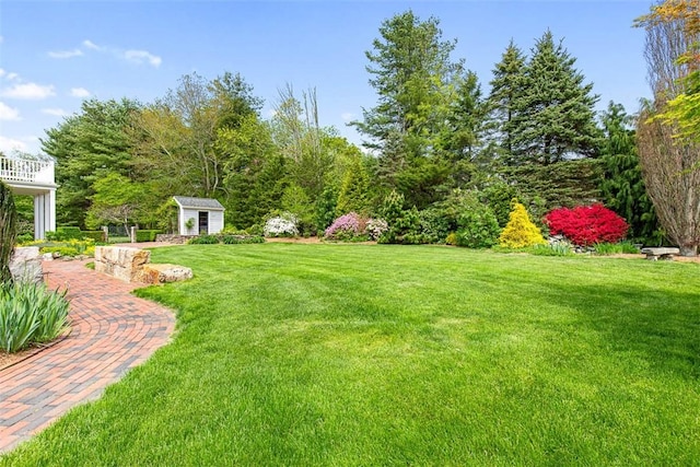 28 Potter Hill Rd, Westerly, RI 02891 - view of green lawn with an outbuilding