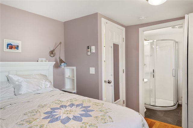 bedroom featuring wood finished floors