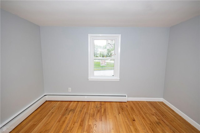 2 King St, Johnston, RI 02919 - unfurnished room featuring baseboards, a baseboard radiator, and light wood finished floors