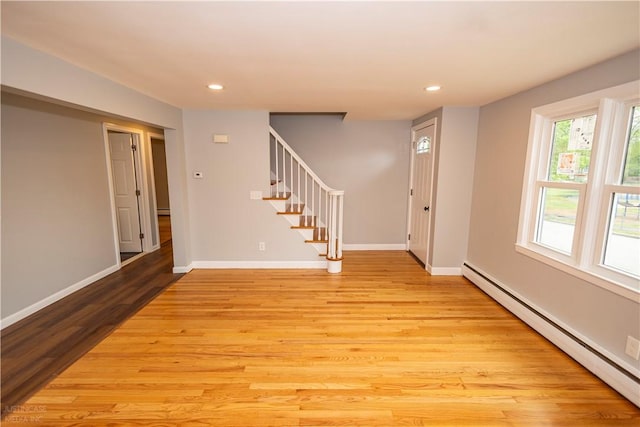 2 King St, Johnston, RI 02919 - interior space with baseboard heating, light wood-style flooring, recessed lighting, baseboards, and stairway