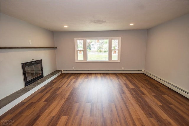 2 King St, Johnston, RI 02919 - unfurnished living room with baseboard heating, a glass covered fireplace, recessed lighting, and wood finished floors