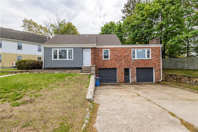 2 King St, Johnston, RI 02919 - ranch-style home featuring fence, a garage, a front lawn, and concrete driveway