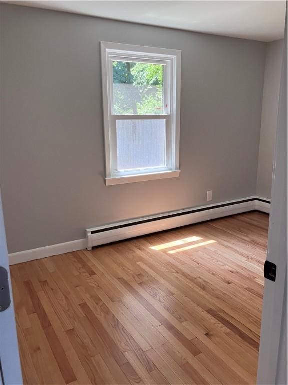 2 King St, Johnston, RI 02919 - unfurnished room with baseboard heating and wood finished floors