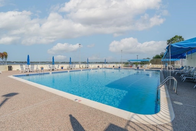 pool with a patio