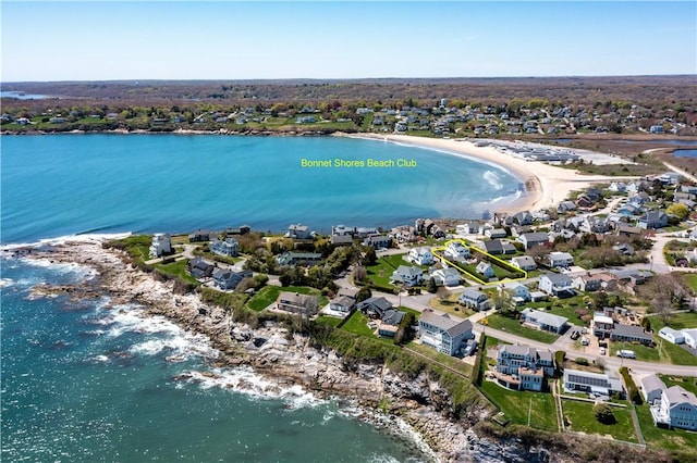 aerial view of residential area featuring expansive coastline
