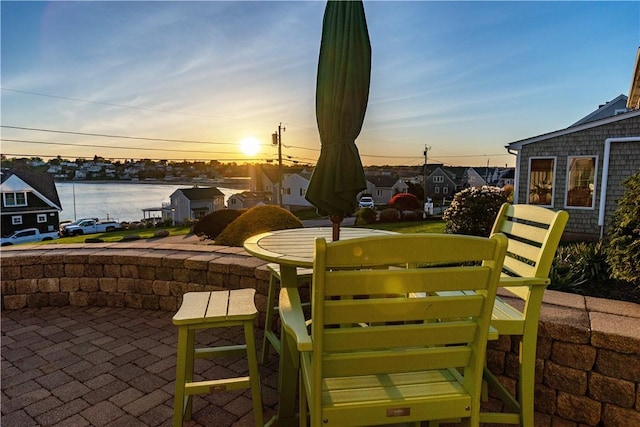 view of patio terrace at dusk