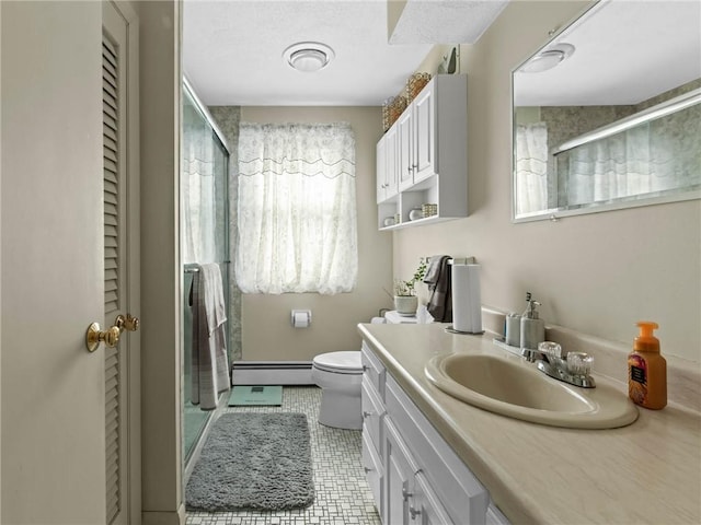 132 Elton Cir, Cranston, RI 02921 - bathroom featuring vanity, toilet, a stall shower, and a baseboard heating unit