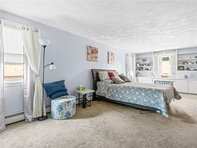 132 Elton Cir, Cranston, RI 02921 - bedroom with multiple windows, a baseboard radiator, and carpet