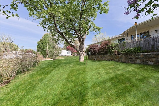 view of yard with fence