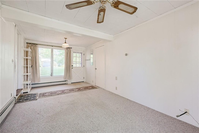 spare room with baseboard heating, ceiling fan, and carpet floors