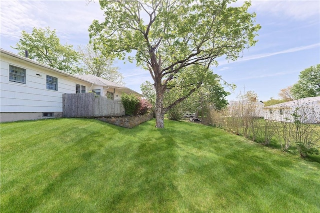 view of yard with fence