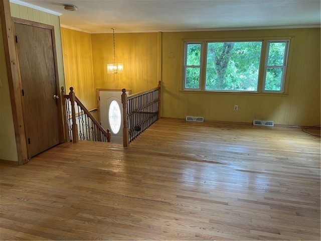 10 Lawnwood Rd, Coventry, RI 02816 - entrance foyer with a chandelier, crown molding, and wood finished floors