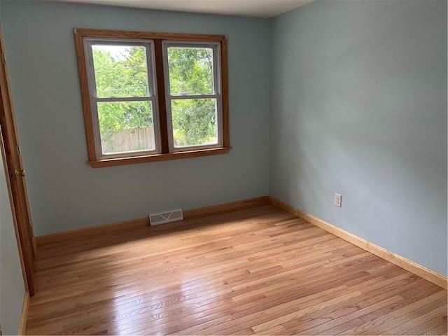 10 Lawnwood Rd, Coventry, RI 02816 - empty room featuring light wood-style floors and baseboards