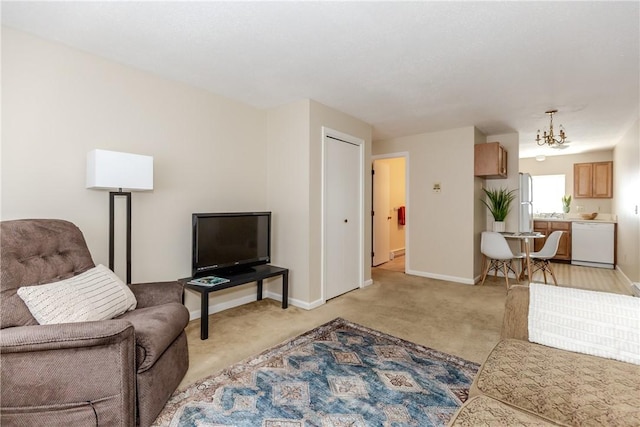 living room with light colored carpet and baseboards