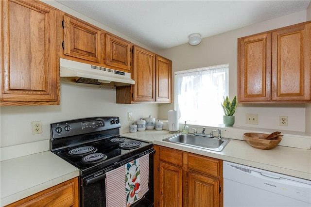 kitchen with light countertops, a sink, black electric range oven, under cabinet range hood, and dishwasher