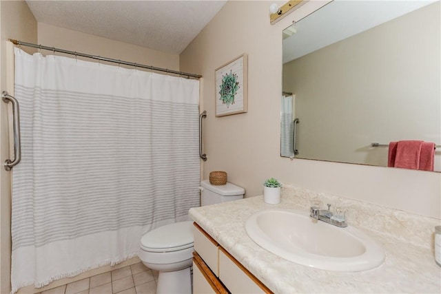 bathroom featuring vanity, toilet, a shower with curtain, and tile patterned floors