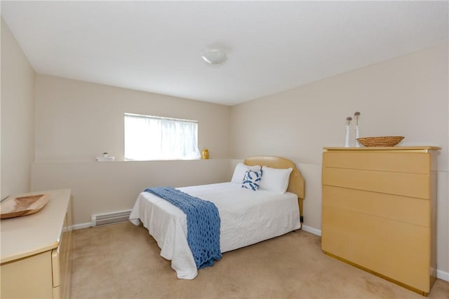 bedroom featuring baseboards, light carpet, and visible vents
