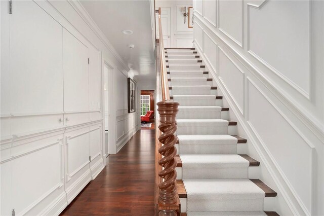 540 Blackstone Blvd, Providence, RI 02906 - stairway with a decorative wall, crown molding, and wood finished floors