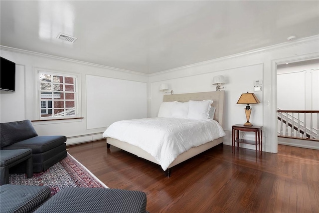 540 Blackstone Blvd, Providence, RI 02906 - bedroom featuring ornamental molding, wood finished floors, baseboard heating, and visible vents