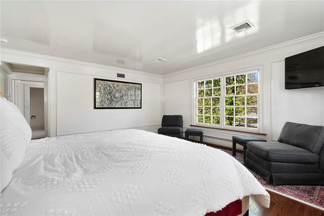 540 Blackstone Blvd, Providence, RI 02906 - bedroom with visible vents, wood finished floors, and ornamental molding