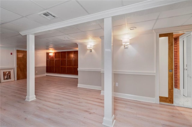 540 Blackstone Blvd, Providence, RI 02906 - finished below grade area featuring a paneled ceiling, a baseboard radiator, visible vents, and wood finished floors