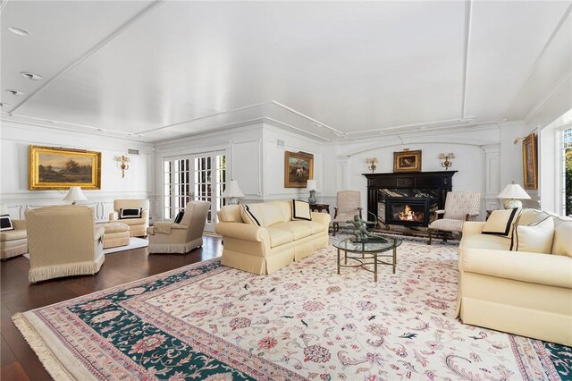 540 Blackstone Blvd, Providence, RI 02906 - living area featuring french doors, a decorative wall, crown molding, hardwood / wood-style floors, and a fireplace
