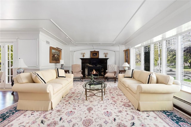 540 Blackstone Blvd, Providence, RI 02906 - living room featuring crown molding, visible vents, and a fireplace