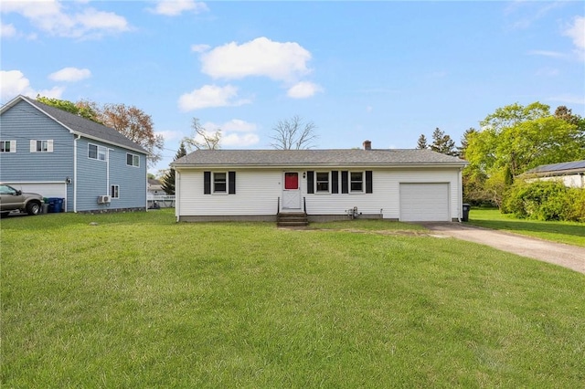 ranch-style house featuring an attached garage, driveway, and a front lawn