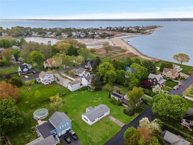 bird's eye view with a water view and a residential view