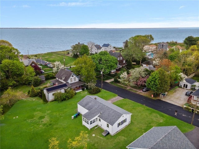 bird's eye view with a water view and a residential view