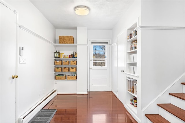 storage area featuring a baseboard radiator