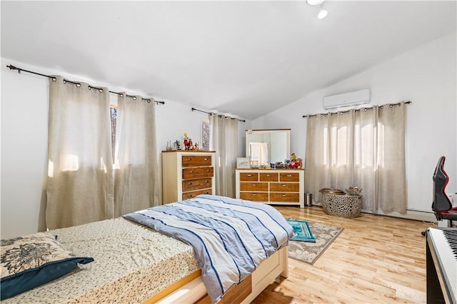 215 Rocky Point Ave, Warwick, RI 02889 - bedroom with light wood-type flooring, a wall mounted AC, and vaulted ceiling