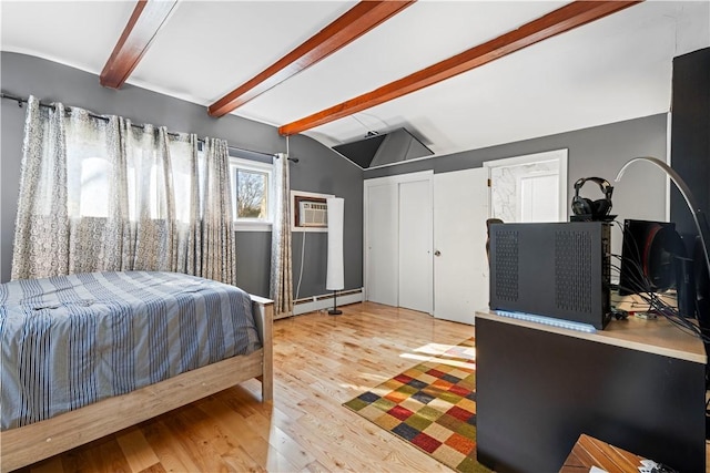 215 Rocky Point Ave, Warwick, RI 02889 - bedroom with attic access, an AC wall unit, a baseboard heating unit, wood finished floors, and vaulted ceiling with beams
