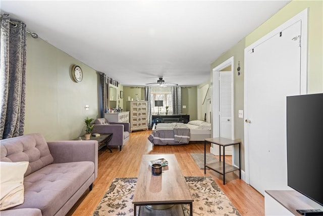 215 Rocky Point Ave, Warwick, RI 02889 - living area with ceiling fan and light wood-type flooring