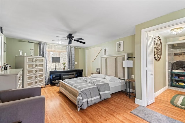 215 Rocky Point Ave, Warwick, RI 02889 - bedroom featuring light wood finished floors, baseboards, and ceiling fan