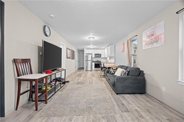 193 Harrison St, Pawtucket, RI 02860 - living room featuring light wood-style flooring