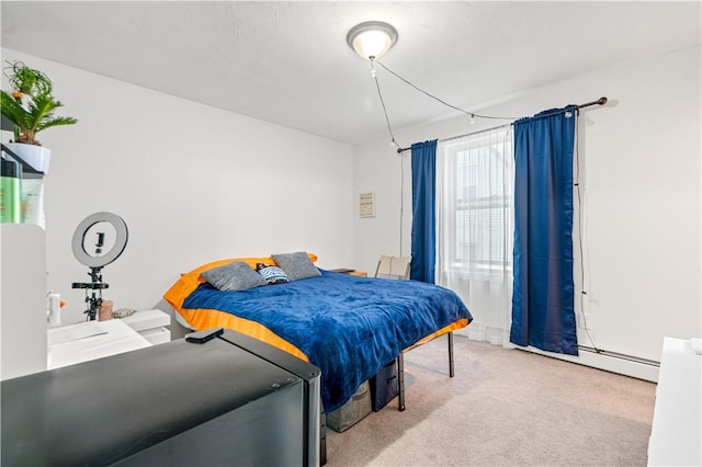 193 Harrison St, Pawtucket, RI 02860 - bedroom with a baseboard heating unit and carpet floors