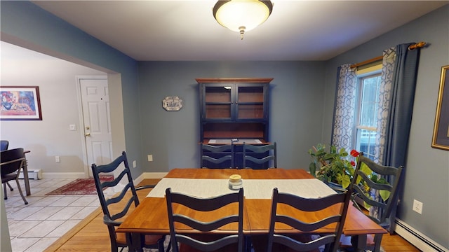 4 Tray Hollow Rd, Foster, RI 02825 - dining space featuring a baseboard radiator, baseboards, and light tile patterned flooring