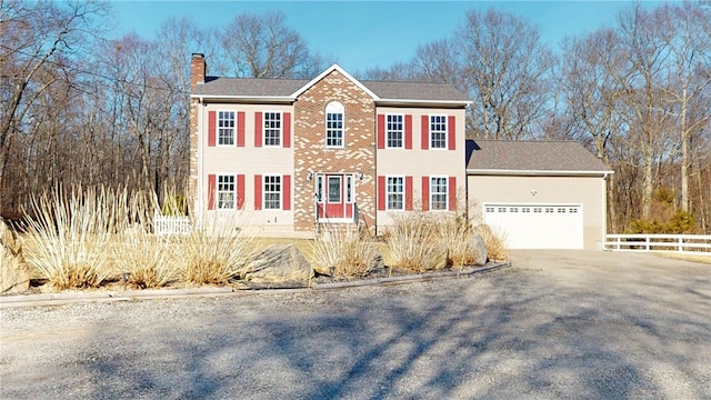 4 Tray Hollow Rd, Foster, RI 02825 - view of front facade with a garage, fence, a chimney, brick siding, and driveway