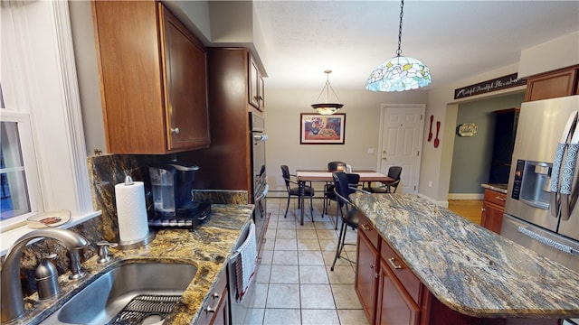 4 Tray Hollow Rd, Foster, RI 02825 - kitchen featuring a sink, stainless steel appliances, pendant lighting, light tile patterned floors, and a center island