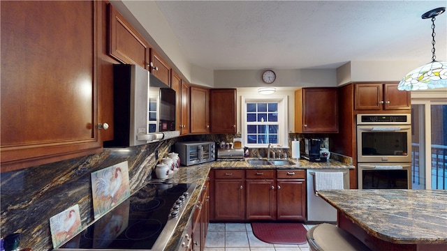4 Tray Hollow Rd, Foster, RI 02825 - kitchen featuring stainless steel appliances, a sink, backsplash, dark stone countertops, and light tile patterned flooring