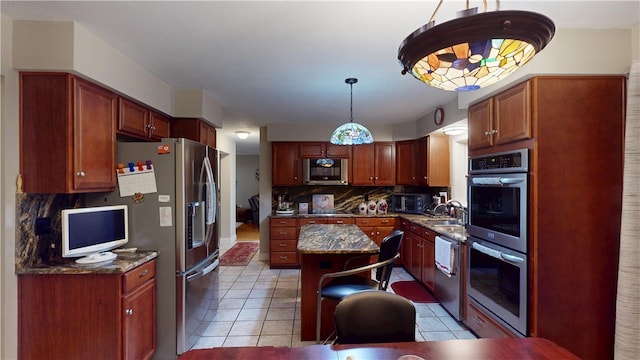 4 Tray Hollow Rd, Foster, RI 02825 - kitchen with stainless steel appliances, a sink, backsplash, a center island, and light tile patterned flooring