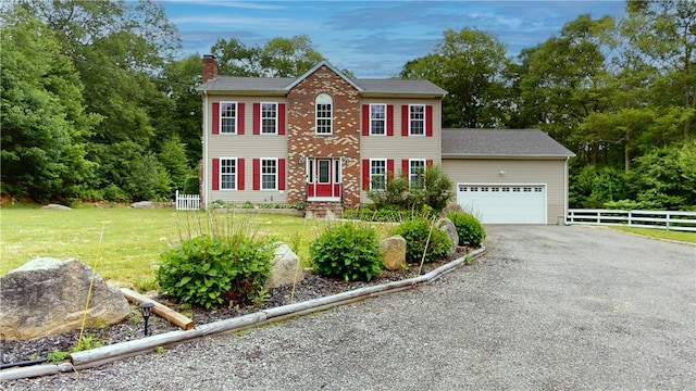 4 Tray Hollow Rd, Foster, RI 02825 - colonial home featuring a chimney, an attached garage, and driveway