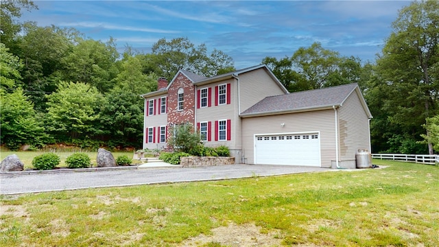 4 Tray Hollow Rd, Foster, RI 02825 - colonial-style house with a garage, driveway, and a chimney