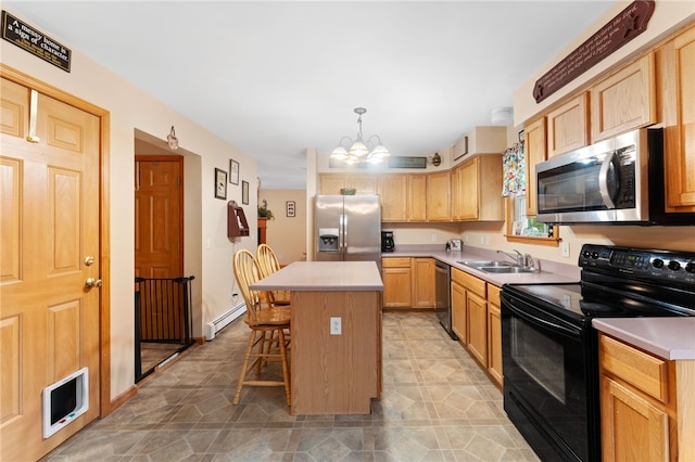 51 Mill Rd, Foster, RI 02825 - kitchen featuring stainless steel appliances, a sink, a baseboard heating unit, a kitchen bar, and a kitchen island