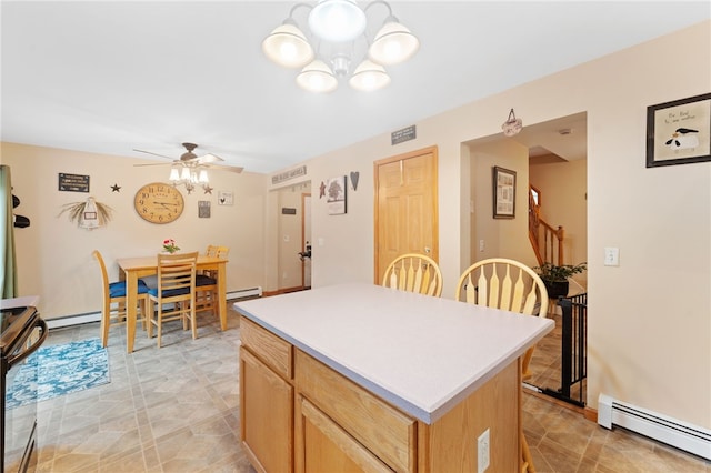 51 Mill Rd, Foster, RI 02825 - kitchen with a baseboard heating unit, range with electric cooktop, a center island, a chandelier, and ceiling fan