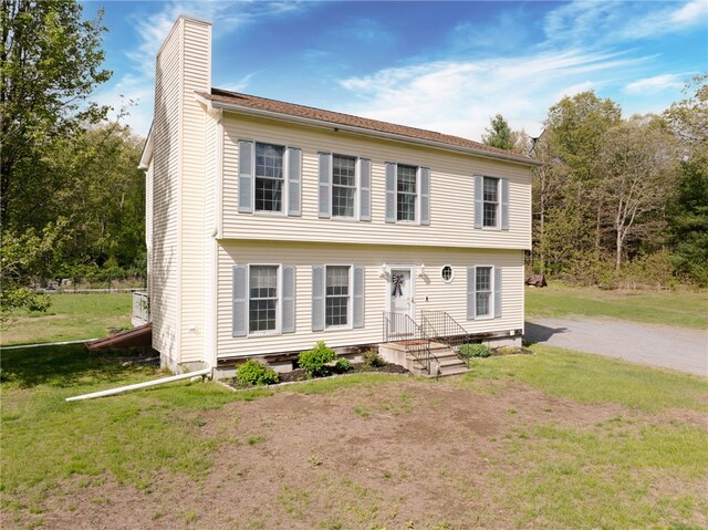 51 Mill Rd, Foster, RI 02825 - colonial home with a chimney and a front lawn