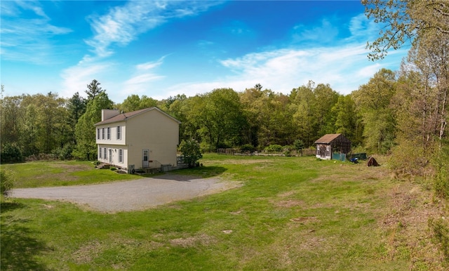 51 Mill Rd, Foster, RI 02825 - view of side of home with a lawn and a view of trees