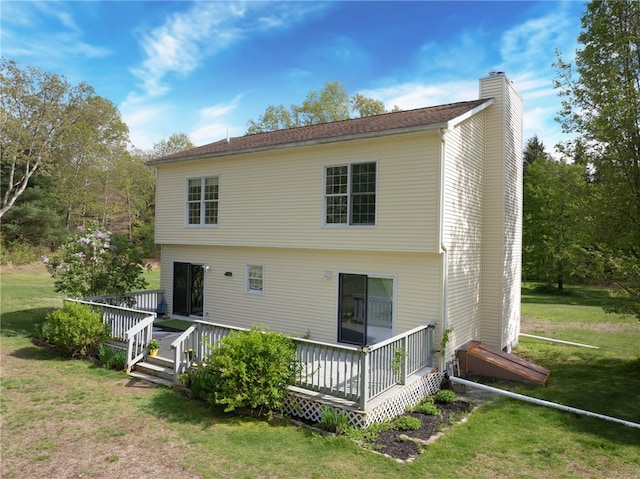 51 Mill Rd, Foster, RI 02825 - back of house featuring a chimney, a wooden deck, and a lawn
