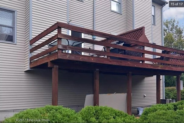 view of exterior entry featuring a deck